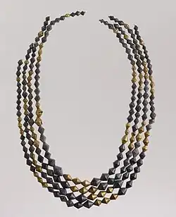 Necklace beads; 2600–2500 BC; gold and lapis lazuli; length: 54&nbsp;cm; Metropolitan Museum of Art