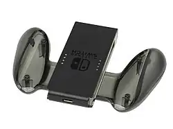 The charging grip upside down, with the USB-C port visible