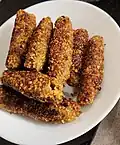 Orkh, Armenian kofta made with meat and bulgur served in cylindrical shapes