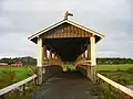 Poukkasilta, a covered bridge over the Loimijoki River in Ypäjä, Finland.