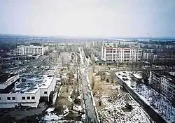 Abandoned apartment blocks with overgrown trees in Pripyat