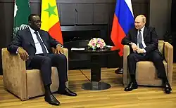 Putin met with the president of the African Union, Macky Sall, to discuss grain deliveries, June 2022. The war in Ukraine contributed to the 2022–2023 food crises.[313]
