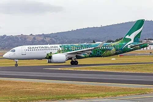 The first Airbus A220 to be delivered to the regional arm QantasLink, wearing the Minyma Kutjara Tjukurpa livery since 2023. It features the artwork of renowned Pitjantjatjara artist Maringka Baker.
