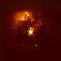 Quasar HE0450-2958 as imaged by the Hubble Space Telescope with advanced image processing known as MCS-deconvolution.