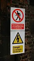 British Rail passenger safety pictograms at the end of the platform at Meols railway station