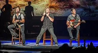 Country music group Rascal Flatts performing on stage