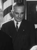 Black-and-white photograph of Richardson Dilworth, standing