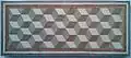 An ancient Roman geometric mosaic. The cubic texture induces a Necker-cube-like optical illusion.