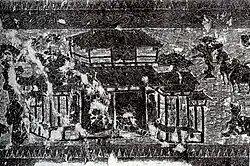 A rubbing of stone artwork depicting a large building complex