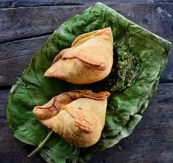Tetrahedral shingaras, with green chutney
