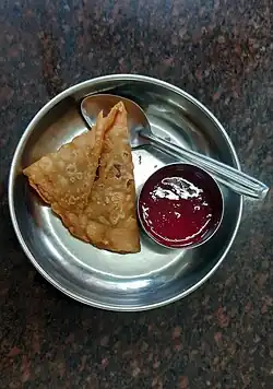 Samosa with tomato ketchup at coffee houses in Kerala