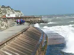 Seawalls to protect against storm surge worsened by sea level rise