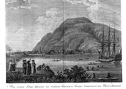 Lithograph showing the settlement of Grigory Shelikhov on Kodiak Island, with wooden buildings along the shoreline, Indigenous people in canoes, and a European sailing ship anchored offshore.
