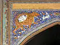Mosaic representations the Lion and Sun on the façade of the Sherdar Madrasa (1636) at the Registan in Samarkand