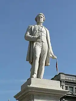 View of stone statue from the ground looking upwards