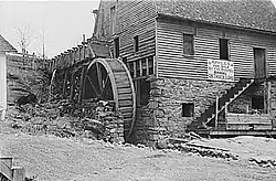Gristmill with overshot water wheel, Skyline Drive, Virginia, 1938