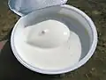 Skyr is an Icelandic cultured dairy product, similar to strained yogurt traditionally served cold with milk and a topping of sugar