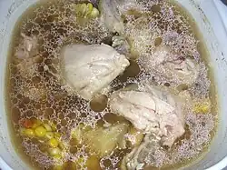 Southern Chinese-style chicken soup with mushrooms and corn pieces