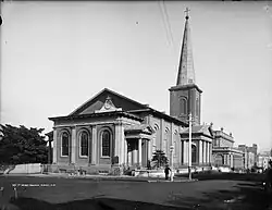 Black and white photo of the church showing the eastern and northern faces.