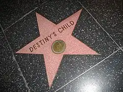 A red star with "DESTINY'S CHILD" written on the front