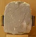 Broken votive stele depicting a man (right) adoring Djeserkare (Amenhotep I, left). 19–20th dynasty, New Kingdom. Limestone, probably found in Deir le-Medina by the Rosellini expedition (1828–29).