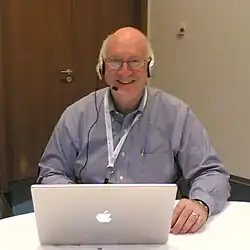 Steve Crocker, sitting with a laptop