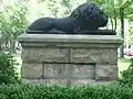 A stone lion at the entrance to St James Court