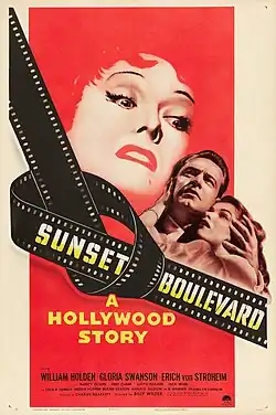 A predominantly red illustration of an older woman's wrathful, enraged face, looming large over a frightened younger couple; the title 'Sunset Boulevard' is displayed over a strip of celluloid film tied in a knot.