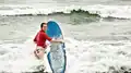 A woman wearing a swim shirt