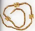A swastika necklace excavated from Marlik, Gilan province, northern Iran, circa 1,200–1,050 BCE