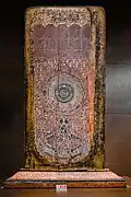 Buddhapada, Teak wood decorated with mother of pearl and glass. Lanna art, late 15th - early 16th centuries. Wat Phra Singh Woramahaviharn.