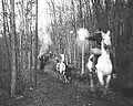 A law posse chasing the robbers, all on horseback