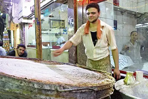 A traditional knafeh maker in Cairo