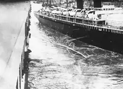 Photograph showing two ships, one which is about to collide with the ship from where the photograph was taken