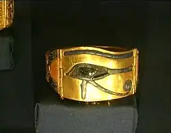 A golden bracelet with the Eye of Horus on it, found in the treasury.