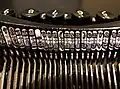 Typebars in a 1920s typewriter