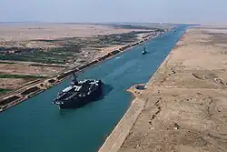 USS&nbsp;America&nbsp;(CV-66), an American aircraft carrier in the Suez Canal