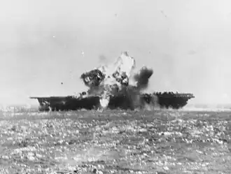 A kamikaze aircraft explodes after crashing into Essex on 25 November 1944