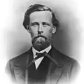 Upper-body portrait of a mid-nineteenth-century man in a suit.