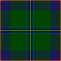 A green square cut into equal quarters by yellow, black, and blue "stitched" lines. Red and white stitches outline the entire square, and patches of blue and green fill the inner quadrants.