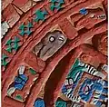 Water, rabbit, deer pictograms on a replica of an Aztec Sun Stone