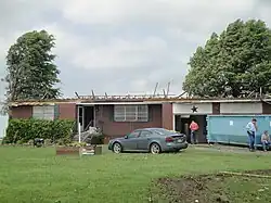 EF2 damage example-- The entire roof of the house was blown off, with only the skeleton of the roof remaining.