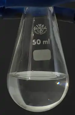 Pure nitric acid in pear-shaped flask