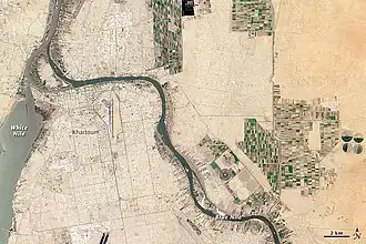 Aerial photograph of Khartoum, showing two rivers joining, each with a distinct coloration of its water