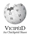 Wikipedia logo displaying the name "Wikipedia" and its slogan: "The Free Encyclopedia" below it, in Irish