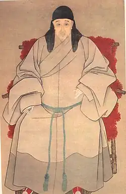 A scholar-bureaucrat in casual dress.