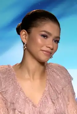 Zendaya with a neutral expression