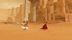 A red-cloaked figure runs through the sand in front of some stone ruins, accompanies by another figure. The trailing figure's robe and scarf are glowing.