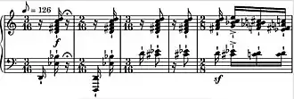 Measures of music starting in 3/16, changing to 2/16, then back, and so forth; polytonal chords are tightly placed throughout