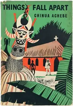 A book cover with the drawing of a traditional masquerade overlapping a local church building with two standing men at the front, and texts "Chinua Achebe" and "Things Fall Apart" written in all capital letters